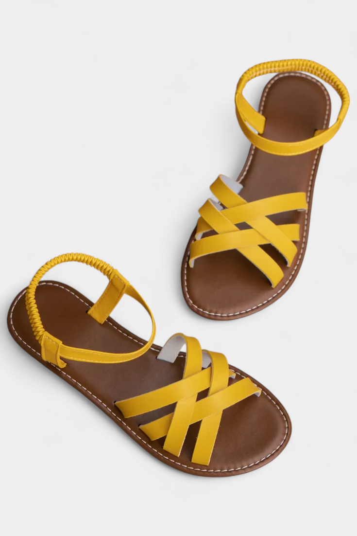 Sandalias planas Romee