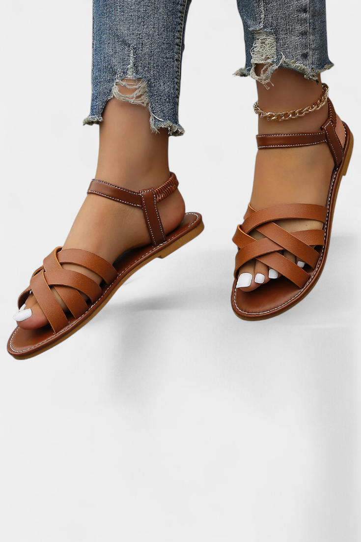 Sandalias planas Romee